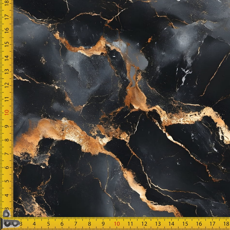 Marble-patterned fabric with gold and black veins, measured against a ruler.